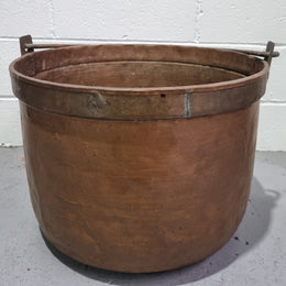 Large Antique French copper cauldron with metal band around rim. It is in good original condition.