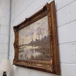 Sourced from France an impressionist oil painting of a beautiful lake scene. It is nicely framed in an Antique frame and in good original detailed condition.