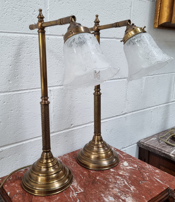 Pair of tall Antique style table lamps with glass floral etched shades. They have been sourced locally and are in good original detailed working condition.