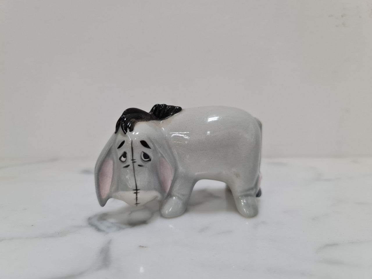 Amazing vintage Beswick Eeyore figurine from Walt Disney Series. Marked to the base " Walt Disney Prod Beswick England ". In great original condition.