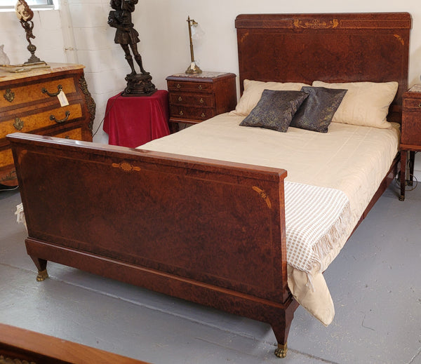 French Art Deco bedroom suite consisting of queen size bed in Amboyna wood and featuring pretty inlay. It comes with a matching pair of bedsides. It is a very stylish and high quality suite. It has been sourced from France and is in good original detailed condition.
