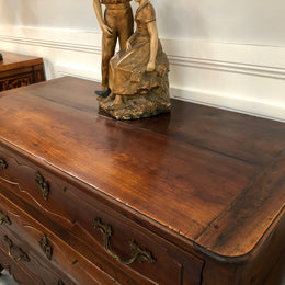 Beautiful 18th Century French all Cherrywood three drawer commode with beautiful ormolu mounts and handles. It is in good original detailed condition.