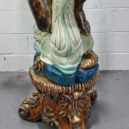 19th Century Italian Wooden Blackamoor lamp sourced in France. Made from carved wood painted & gilded. Amazing detail of a man playing a horn that then turns into a chandelier while riding a mythological sea serpent  It has been fully rewired to Australian standards.