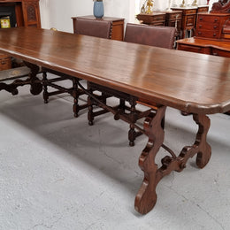 Amazing hard to find French Fruitwood Spanish style 3 meter dining table. Decorative iron work underneath and in good detailed original condition.