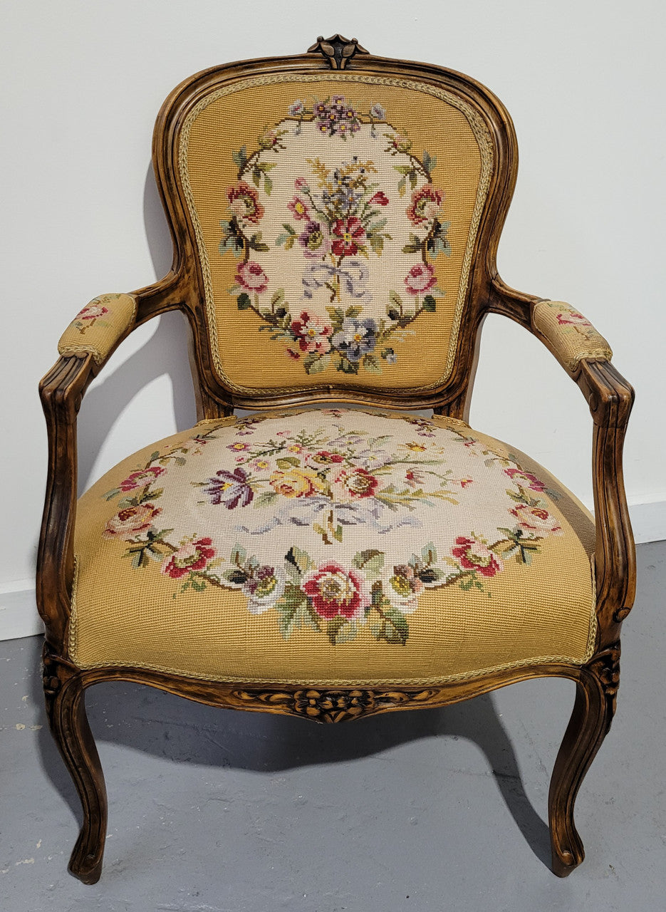Louis XV style Walnut and tapestry armchair. Very comfortable to sit in and tapestry is in good original used condition.