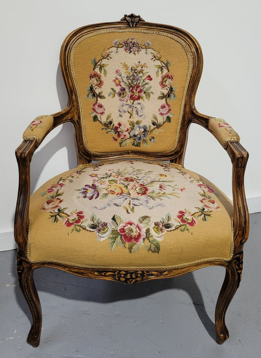 Louis XV style Walnut and tapestry armchair. Very comfortable to sit in and tapestry is in good original used condition.