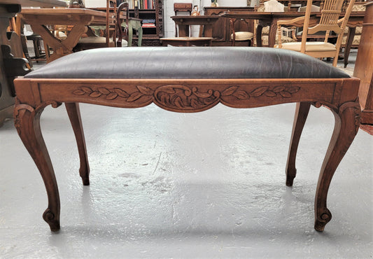 French Oak newly upholstered leather look duet stool. In good original detailed condition and new upholstery.