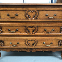 French nicely carved Oak chest of three drawers. In good original detailed condition.