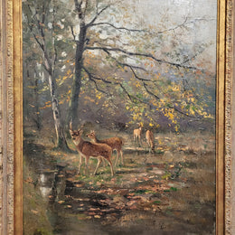 Charming oil painting on canvas depicting a forest scene and deer in an ornate gilt frame. In good original detailed condition.