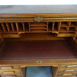 An Antique American Oak Cutler Roll Top Desk