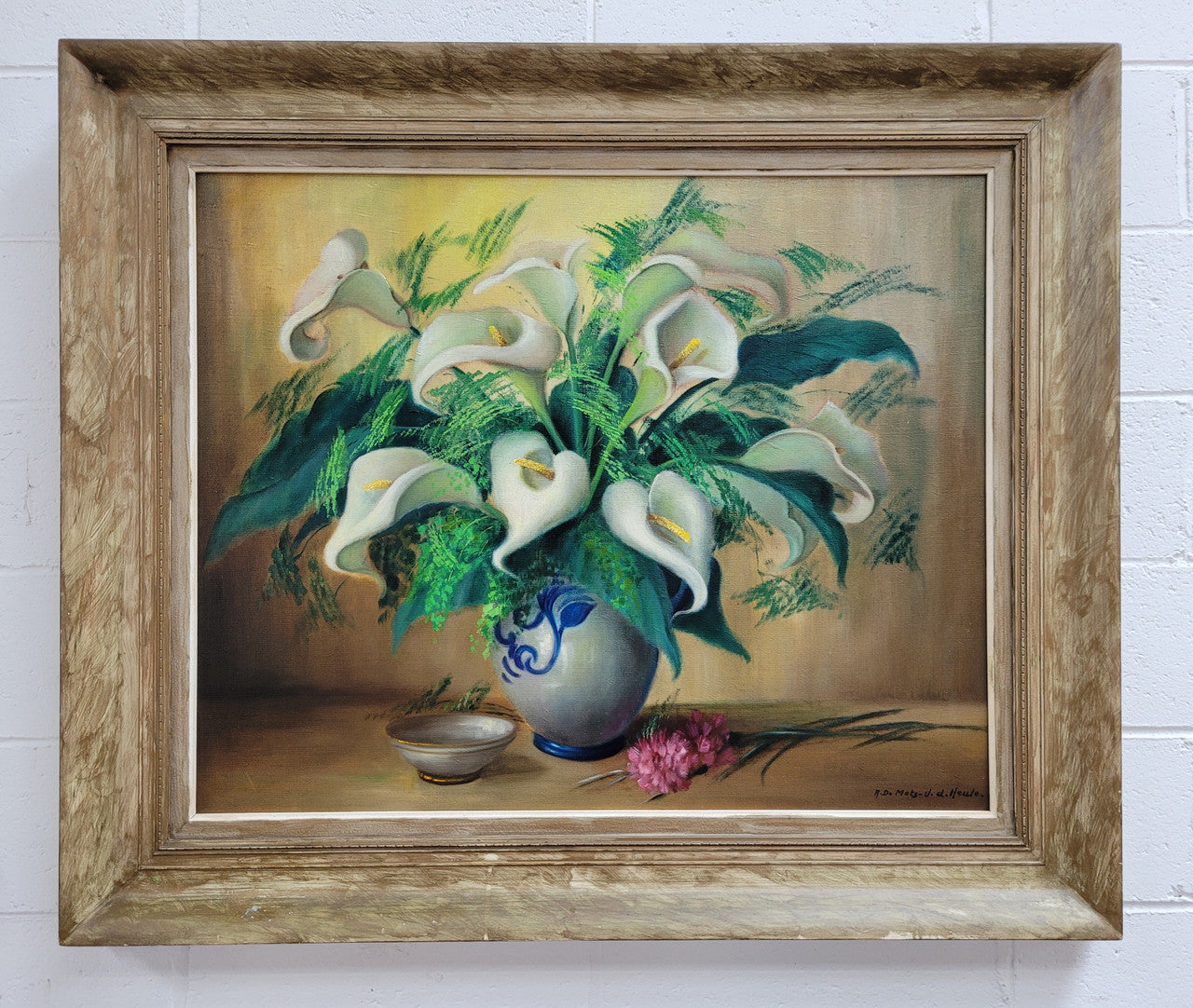 Signed and sourced in France a vintage oil on board still life of white lillie's in vase. In a beauitufl frame and it is in good original detailed condition.