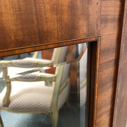 Beautiful Amboyna and Walnut Trumeau mirror. Has lovely parquetry inlay and is in good original condition.