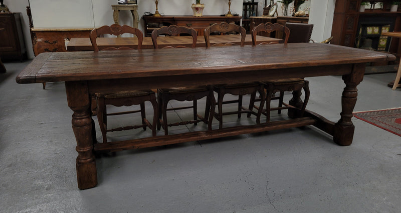Amazing 2.65 meter French Elm Refectory dining table with loads of rustic charm. This table has been sourced from France and can comfortably seat ten people. It is in good original detailed condition.