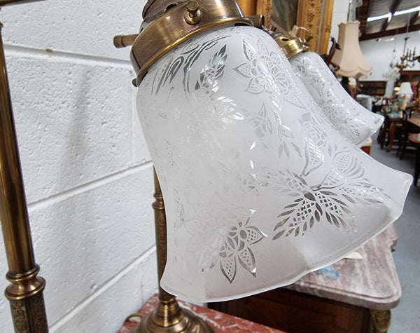 Pair of tall Antique style table lamps with glass floral etched shades. They have been sourced locally and are in good original detailed working condition.