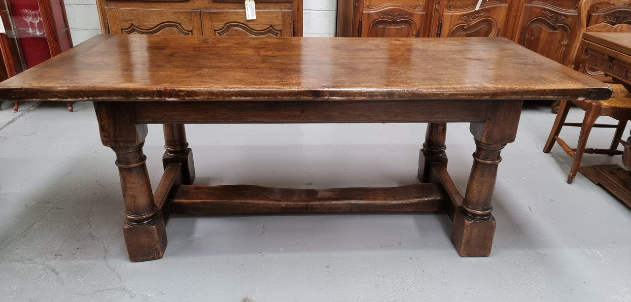 Lovely vintage French dark Oak pedestal base Farmhouse table. It can comfortable sit eight and it is in good original condition.