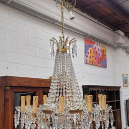 Fine French Empire basket shaped crystal chandelier. Consisting of ten exterior arms and four interior lights. It has stunning crystal's with prism drops. It has been sourced from France fully rewired to Australian standards.