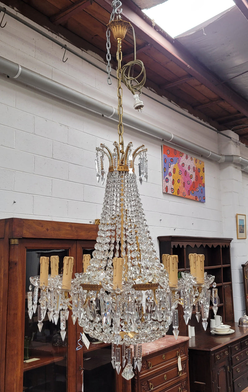 Fine French Empire basket shaped crystal chandelier. Consisting of ten exterior arms and four interior lights. It has stunning crystal's with prism drops. It has been sourced from France fully rewired to Australian standards.