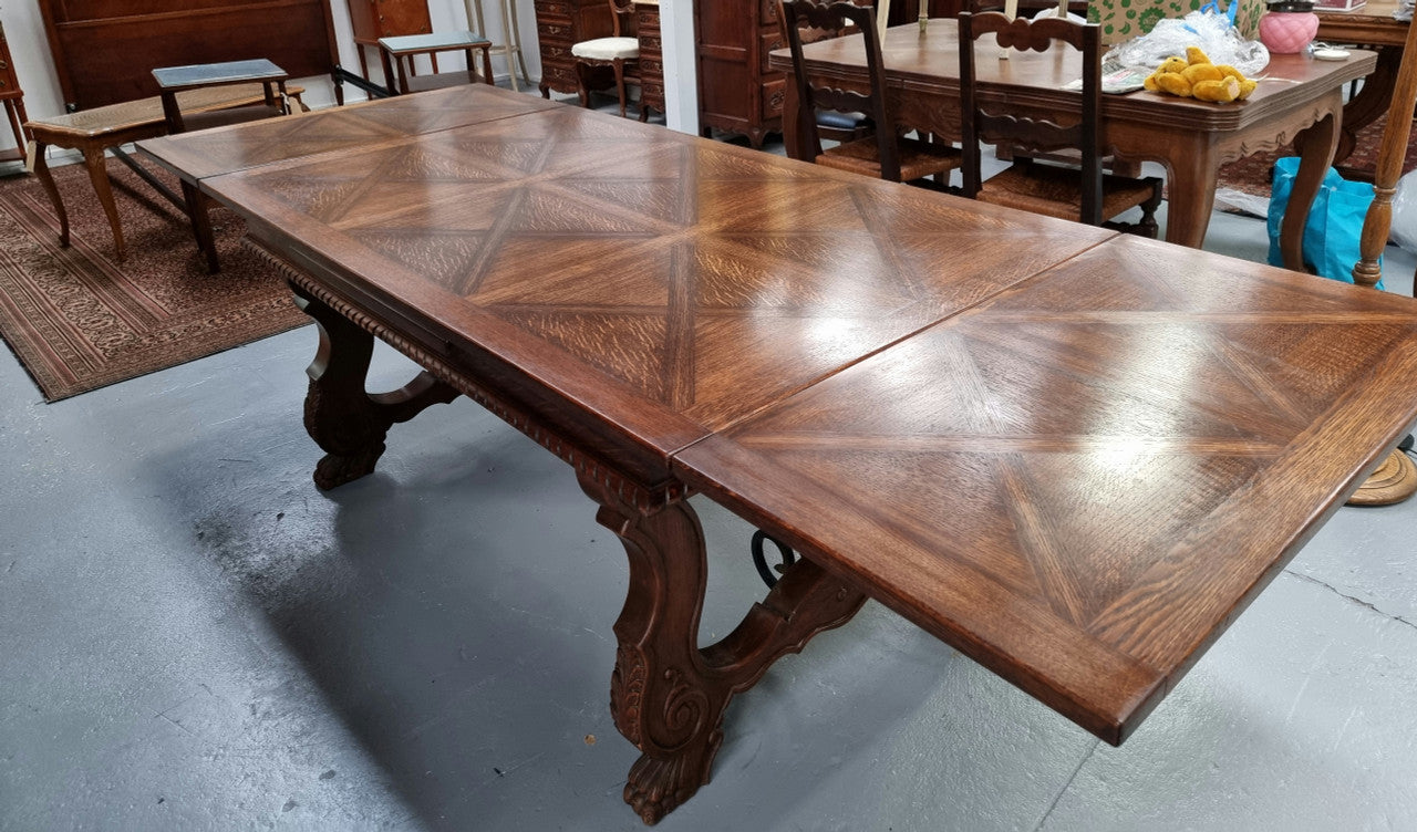 French Spanish style Oak parquetry top extension table. In good original detailed condition.