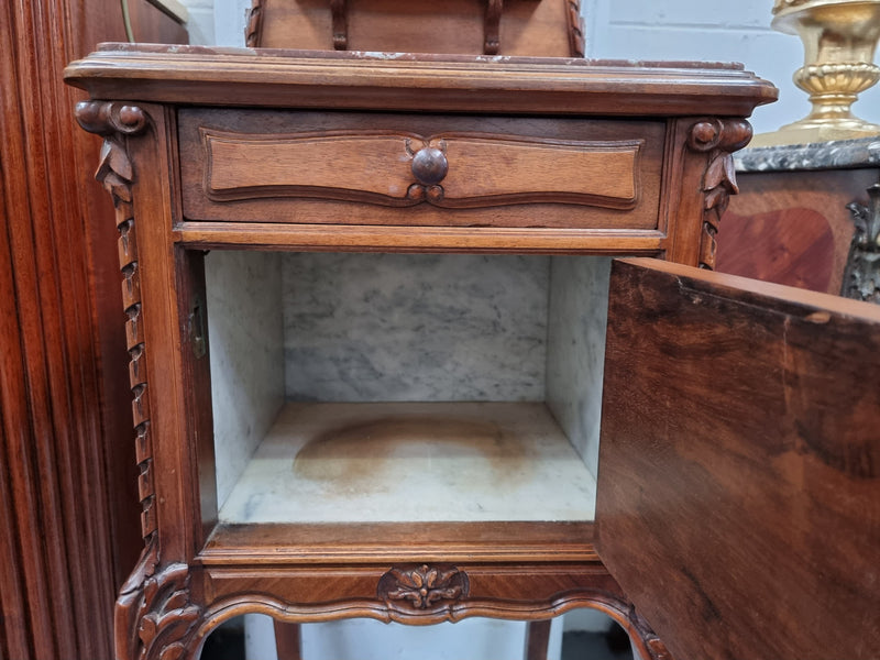Single Louis 15th Inset marble bedside cabinet. It has a fully marbled interior and a wooden shelf on top. In good original detailed condition.