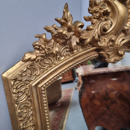 Late 19th Century French Louis XV style carved gilt wall mirror. Sourced from France and in good original detailed condition.