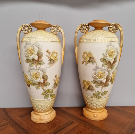 Lovely pair of Edwardian floral vases from Austria with beautiful roses on them in good original condition. Some crazing throughout please view photos as they help form past of the description.