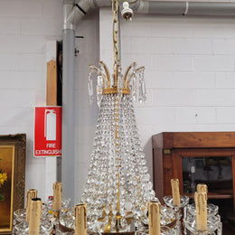 Fine French Empire basket shaped crystal chandelier. Consisting of ten exterior arms and four interior lights. It has stunning crystal's with prism drops. It has been sourced from France fully rewired to Australian standards.