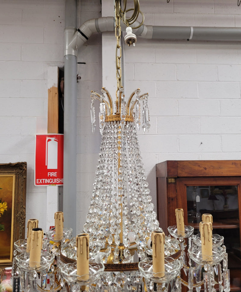 Fine French Empire basket shaped crystal chandelier. Consisting of ten exterior arms and four interior lights. It has stunning crystal's with prism drops. It has been sourced from France fully rewired to Australian standards.