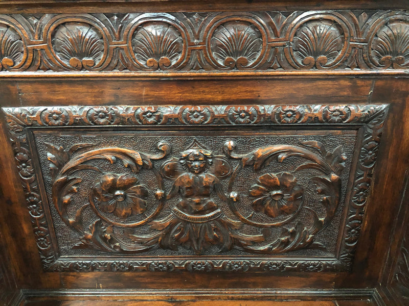 Beautifully carved 19th century gothic style hall seat. The seat lifts up for storage underneath and in very good condition.