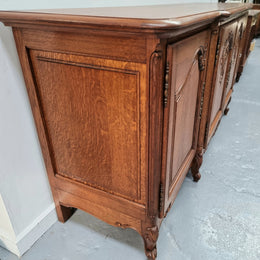 French oak large, beautifully carved four door sideboard with lockable doors and plenty of room for storage in good original condition.