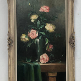 Charming oil painting of roses, signed and beautifully framed. In good original condition.
