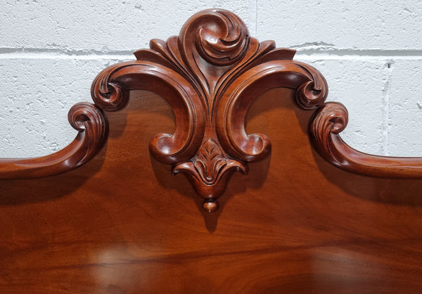 Beautiful Antique Victorian Mahogany two door Chiffonier. Plenty of storage space with one drawer and the two doors open up to a shelved area. It is in good restored condition.