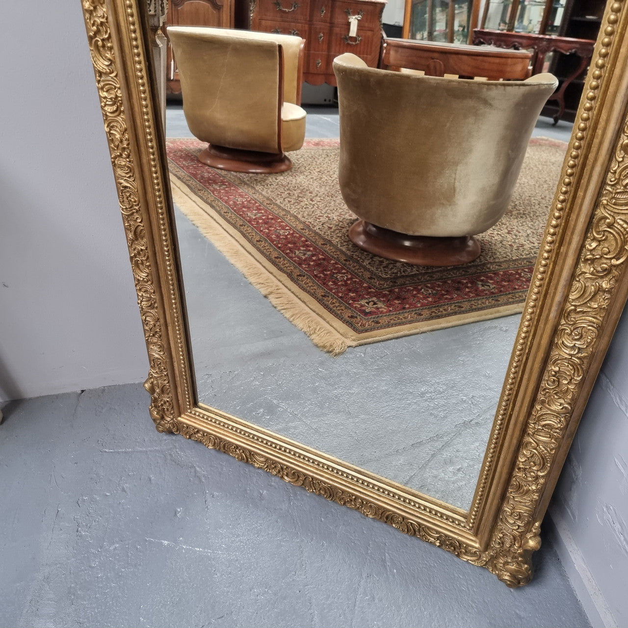 Late 19th Century French Louis XV style carved gilt wall mirror. Sourced from France and in good original detailed condition.