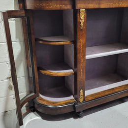 Victorian Rosewood inlaid side cabinet/credenza with velvet lined shelves and gilt mounts. It has been sourced locally and is in good original condition with loads of character.