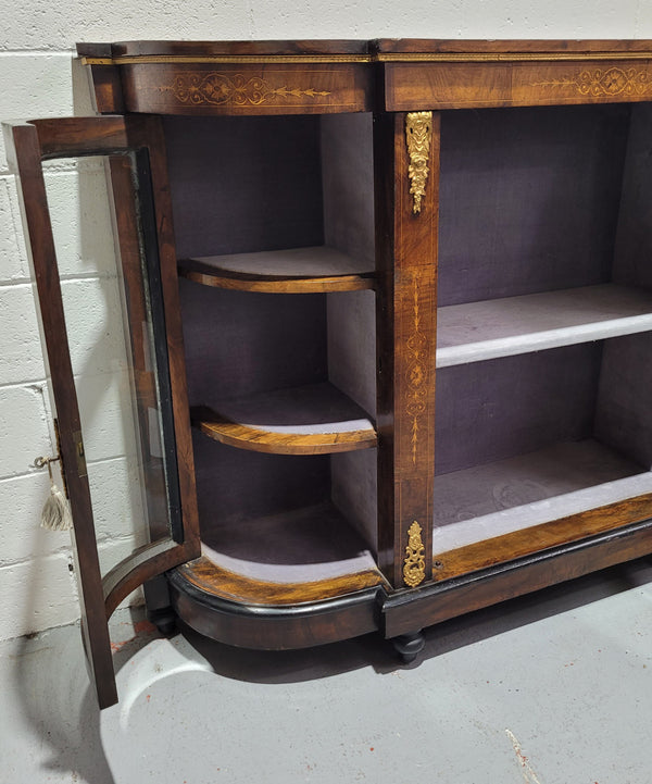 Victorian Rosewood inlaid side cabinet/credenza with velvet lined shelves and gilt mounts. It has been sourced locally and is in good original condition with loads of character.