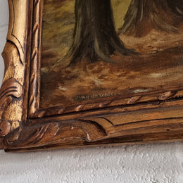 French signed oil on canvas depicting a charming landscape scene in a decorative gilt frame. It is in good original detailed condition and has been sourced from France.