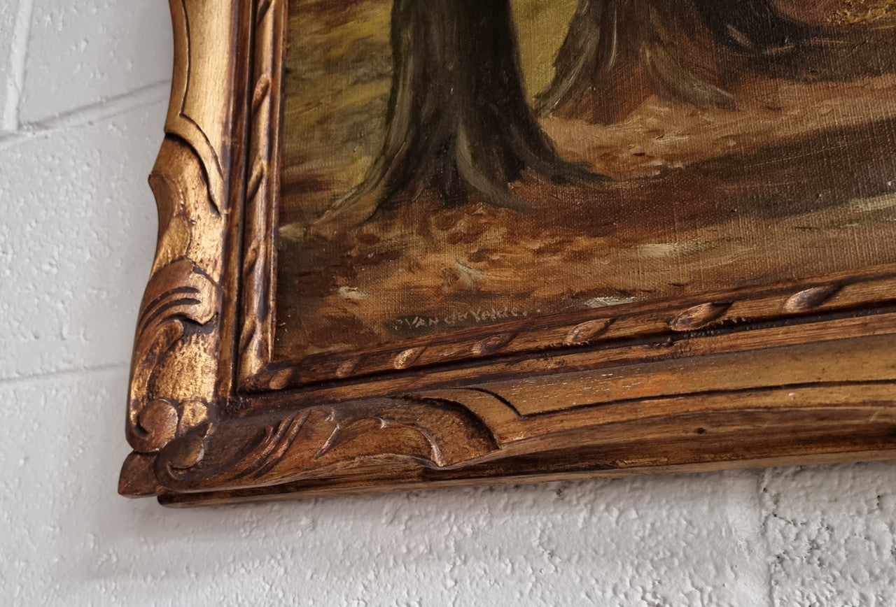 French signed oil on canvas depicting a charming landscape scene in a decorative gilt frame. It is in good original detailed condition and has been sourced from France.