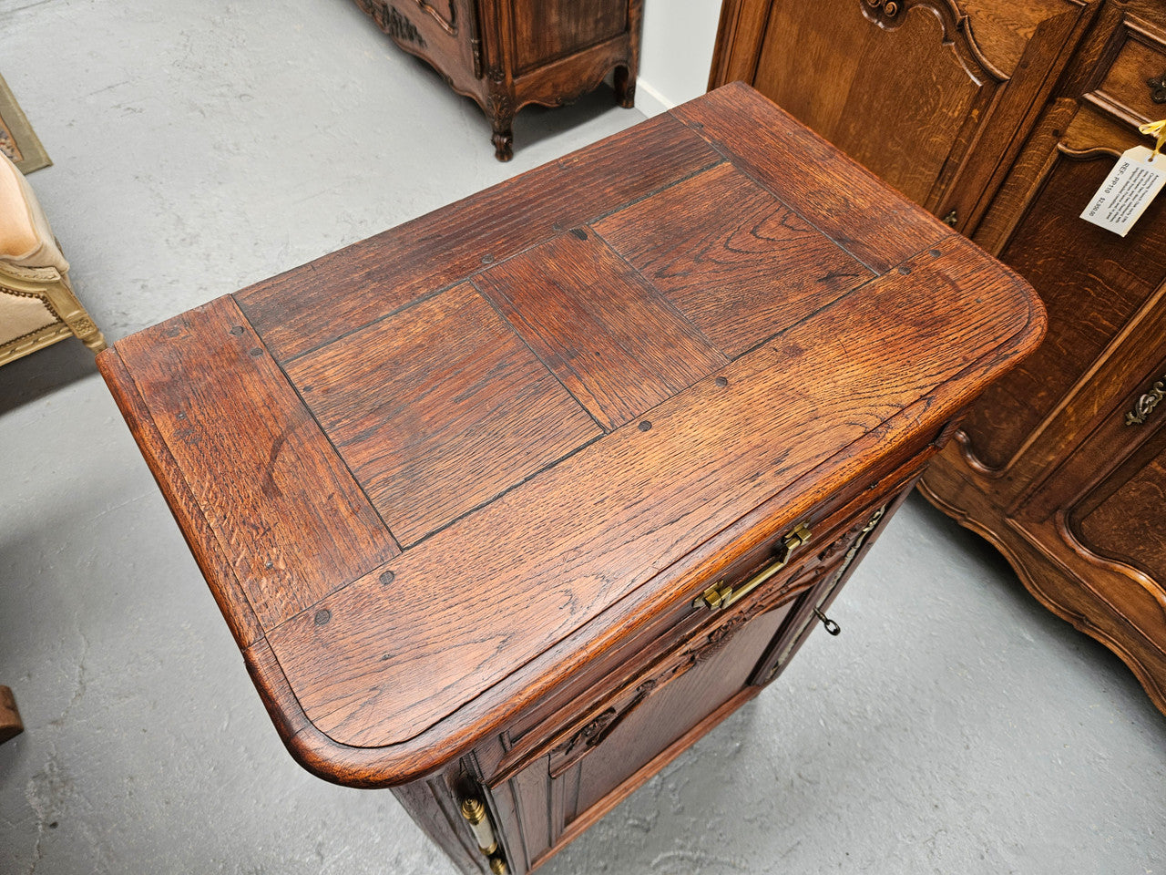 Louis 15th style oak 19th century cabinet with lovely brass hinges, handles & charming carving.  Circ: 1860's. In good original condition.