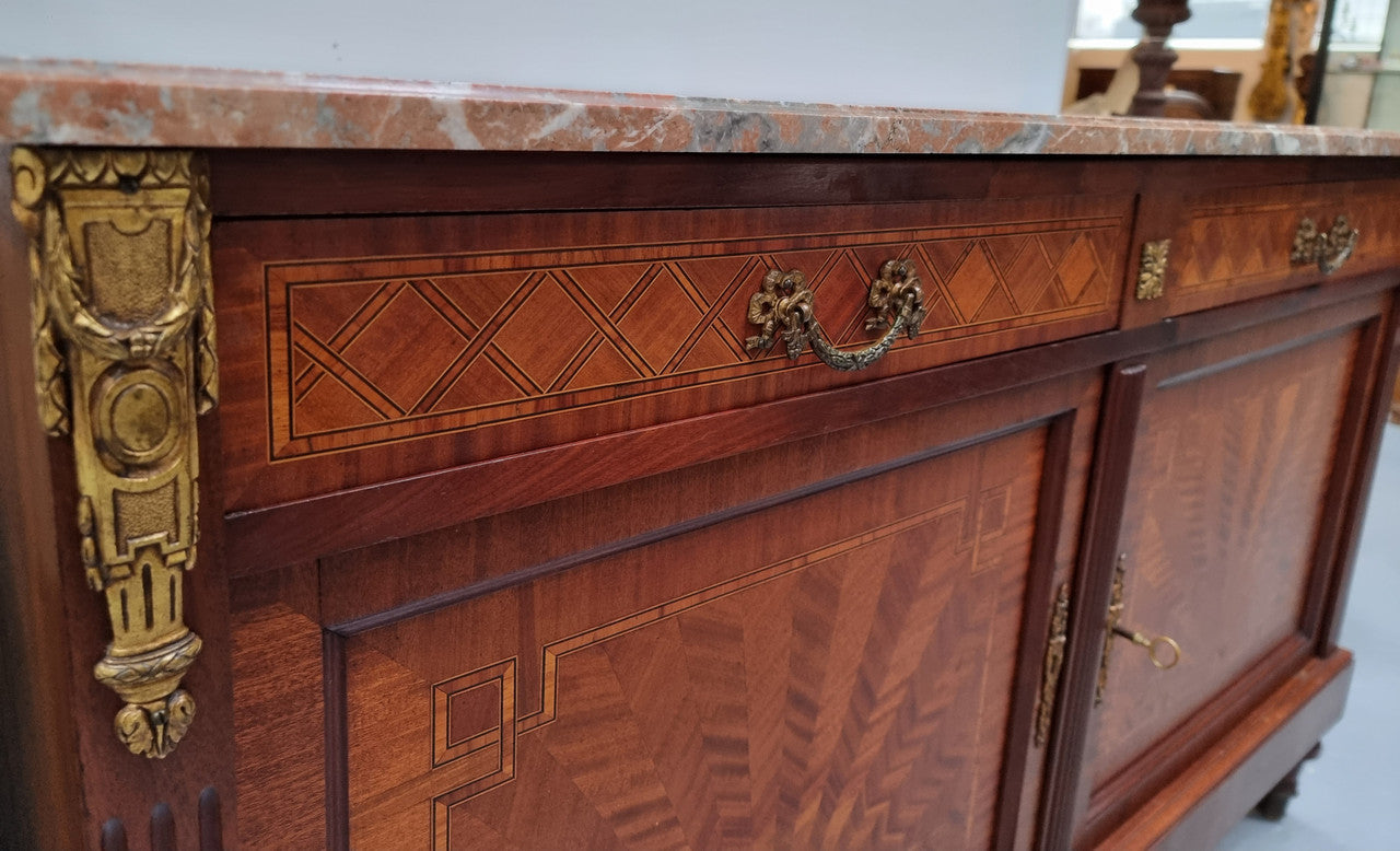 Louis 16th style Mahogany marble top cupboard and two drawers with decorative marquetry inlay and gilt bronze mounts. In good original detailed condition.