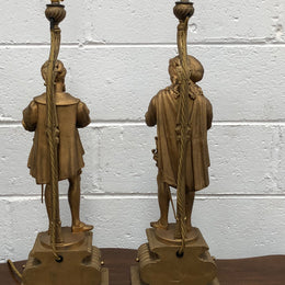 Fabulous pair of French gilt metal table lamps. One is of "The Artist" and the other of "The Sculptor". Lamps are wired to Australian standards and are in good original condition. Circa 1880.