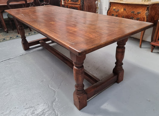 Vintage French Oak stretcher base farmhouse table. It is in good original condition.
