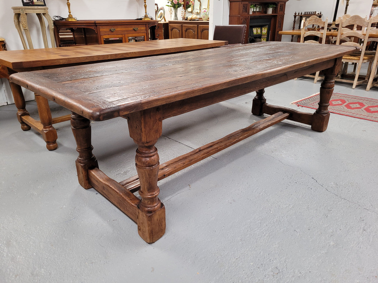 Amazing 2.65 meter French Elm Refectory dining table with loads of rustic charm. This table has been sourced from France and can comfortably seat ten people. It is in good original detailed condition.