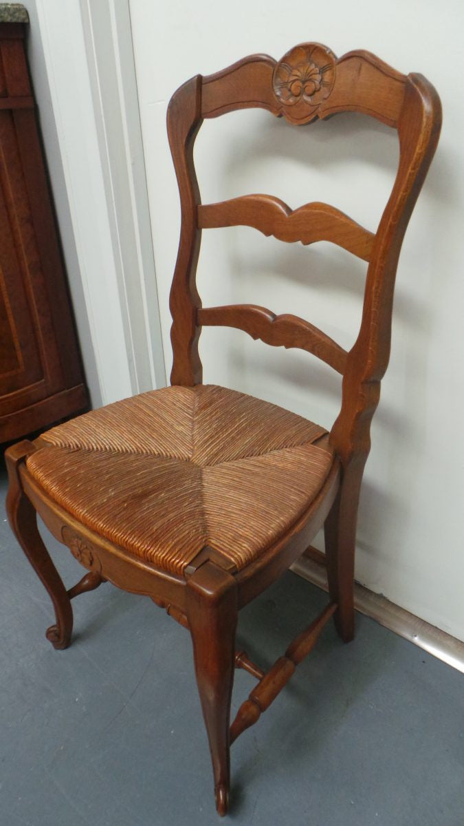 A Set Of Six French Solid Oak Dining Chairs