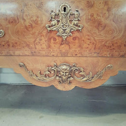A large French Louis XV style Burr Walnut commode with a beautiful marble top. Has beautiful detailed mounts and plenty of storage space with two large drawers. From circa 1920 and in very good original condition.