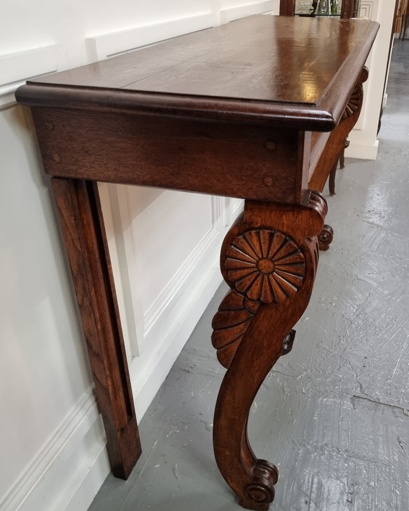 Beautiful 19th Century French Oak console table of great narrow proportions. It has been sourced from France and it is good original detailed condition.