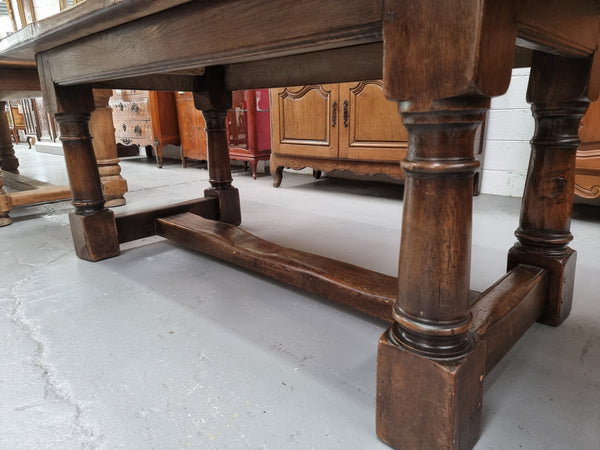 Lovely vintage French dark Oak pedestal base Farmhouse table. It can comfortable sit eight and it is in good original condition.