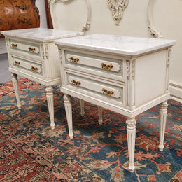 Attractive pair of Vintage French Louis 16th style two drawer marble topped bedsides. They have been sourced from France and are in good original condition.
