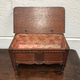Beautiful Antique oak miniature coffer lined with lovely fabric and would make a fabulous jewellery box . In good condition.