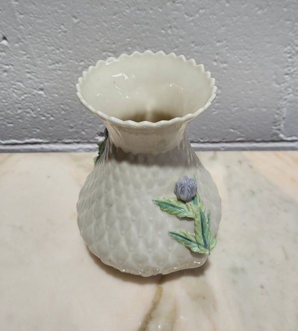 Vintage Belleek Irish porcelain vase a beautiful, rare piece in the thistle design.  Belleek produces fine porcelain characterized by its slightly iridescent glaze. Brown Mark 1980 – 1993.