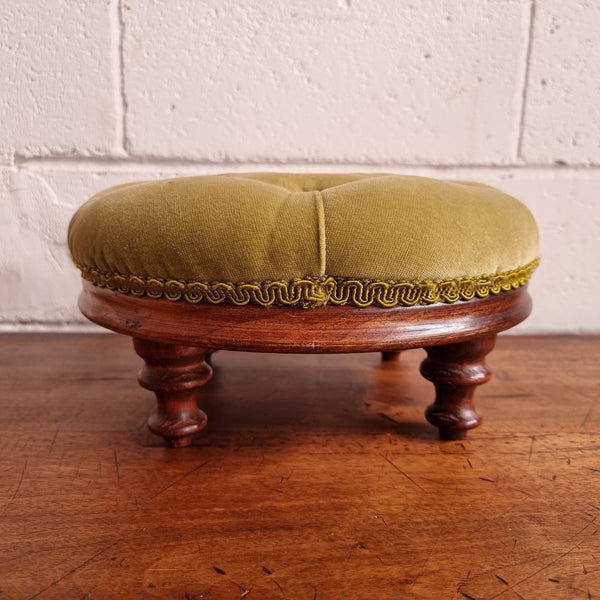 Vintage round upholstered buttoned footstool. Sourced locally and is in good original condition, please view photos as they help for part of the description.