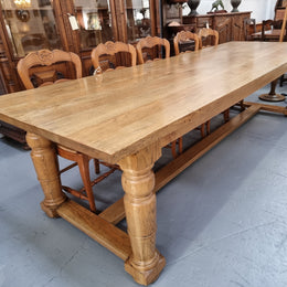 Stunning three meter Bespoke English Oak stretcher base farmhouse dining table. Can easily sit 10-12 people and is in very good original detailed condition.